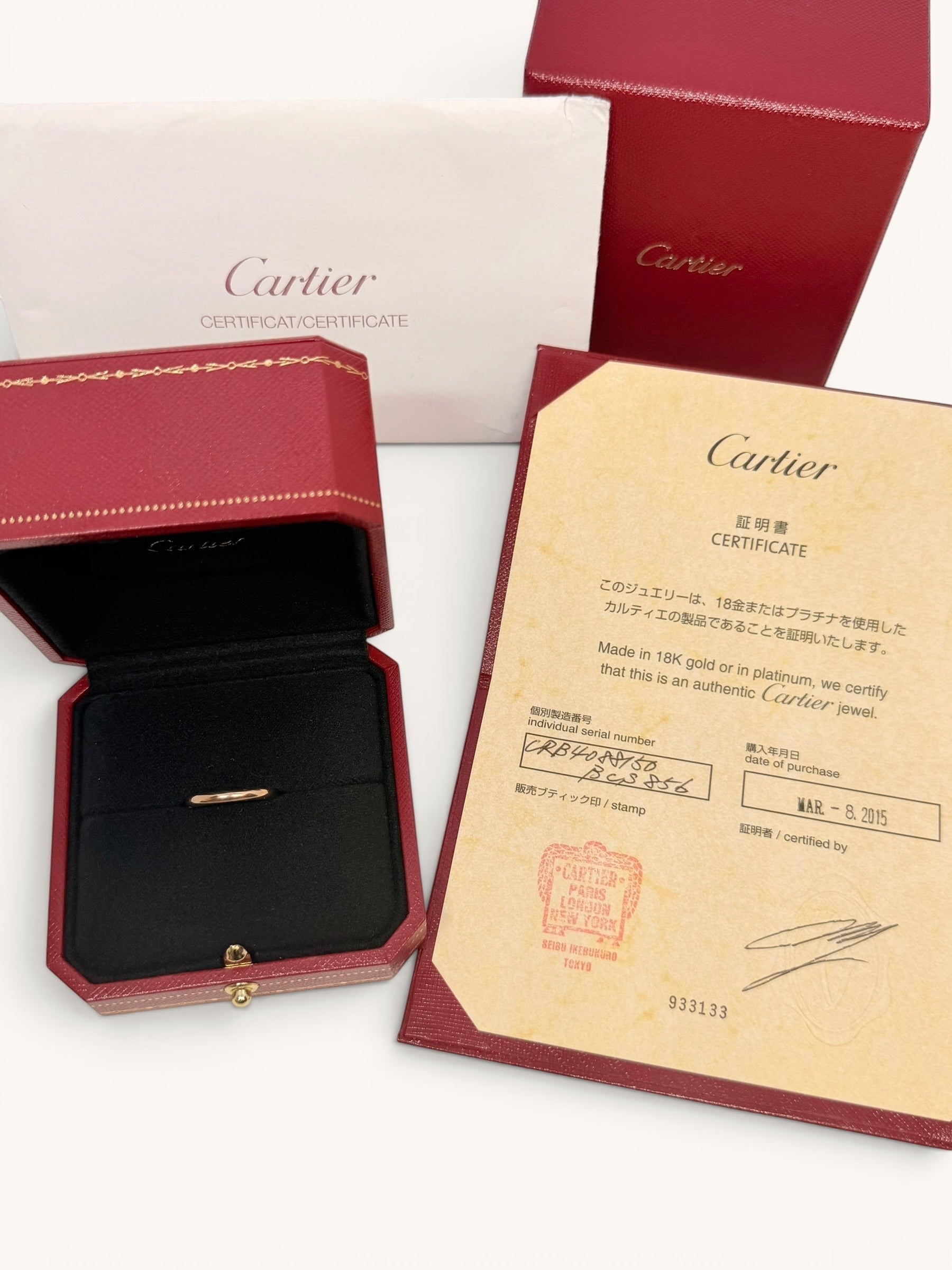 By the Hour Cartier 1895 wedding band in pink gold, 2.5mm wide, presented in its original red Cartier box with certificate.