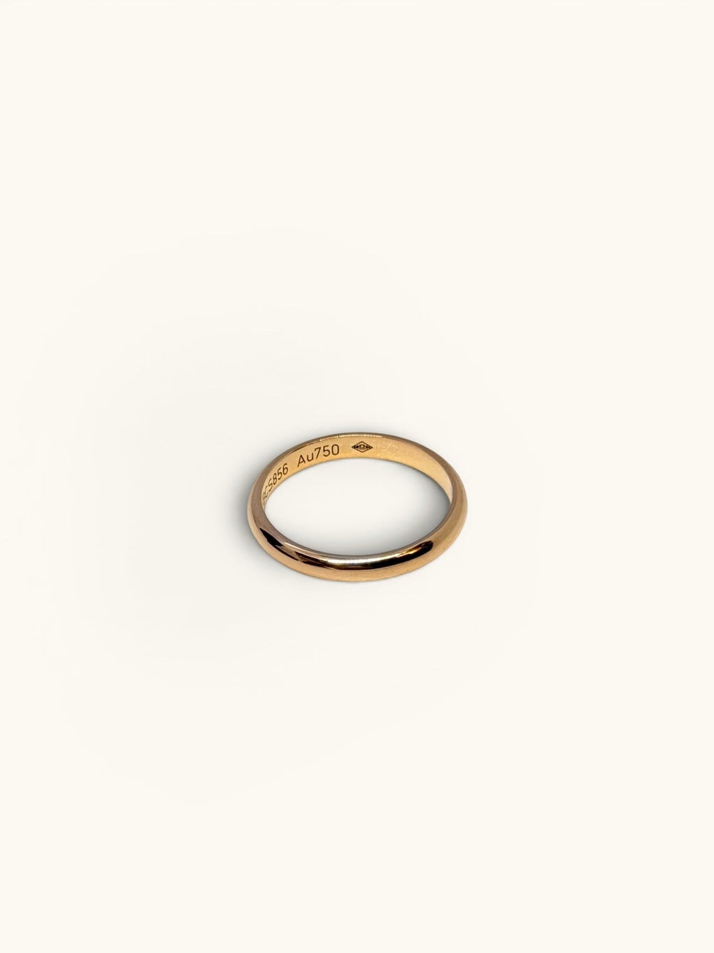 By the Hour Cartier 1895 wedding band in rose gold. Timeless design, 2.5mm width, suitable as an accessory.