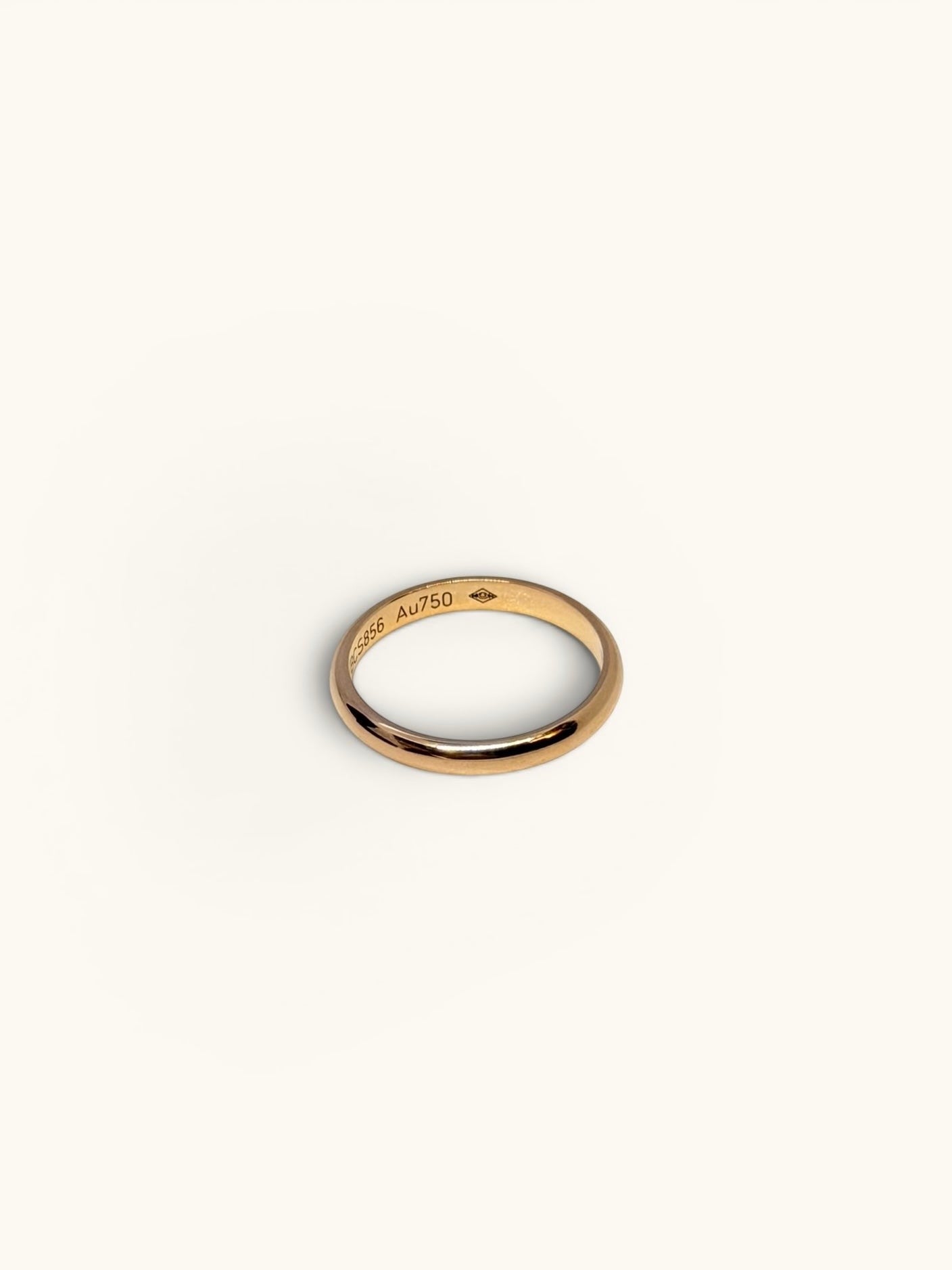 By the Hour Cartier 1895 wedding band in rose gold. Timeless design, 2.5mm width, suitable as an accessory.