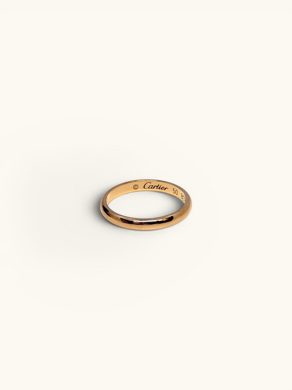 By the Hour Cartier 1895 wedding band in pink gold. Timeless design, 2.5mm wide, size EU 50.