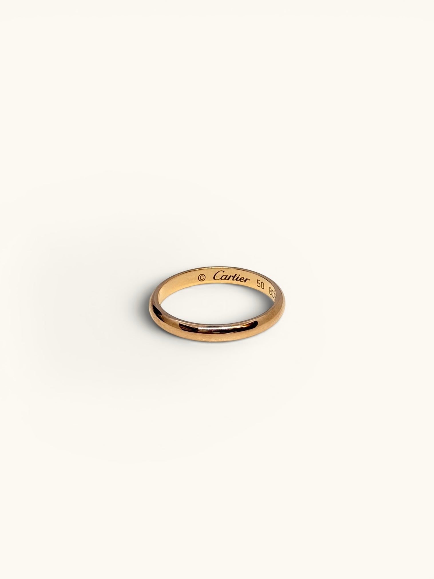 By the Hour Cartier 1895 wedding band in pink gold. Timeless design, 2.5mm wide, size EU 50.